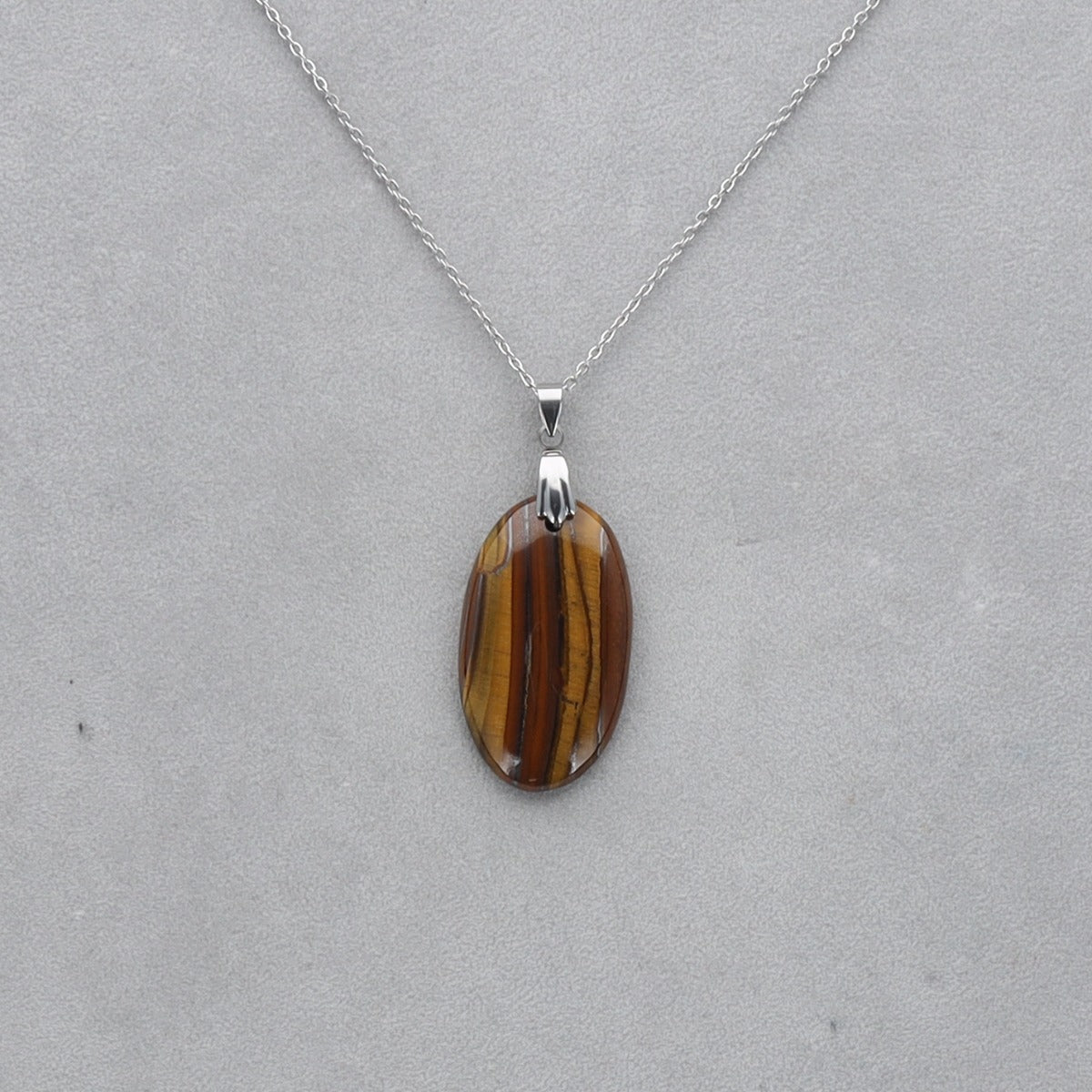 Oeil de Tigre Cabochon percé 55