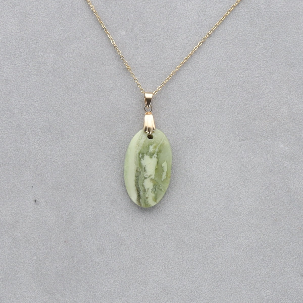 Serpentine Cabochon percé 32